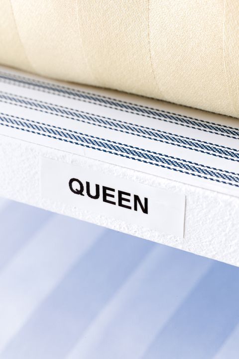 queen linen label on shelf