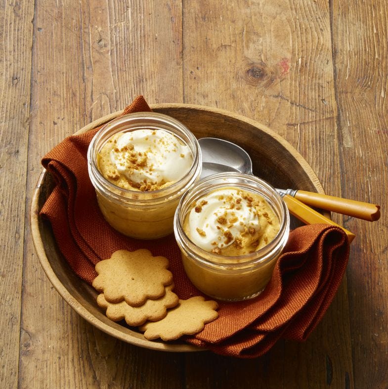 pumpkin spice mousse in jars with cookies on the side