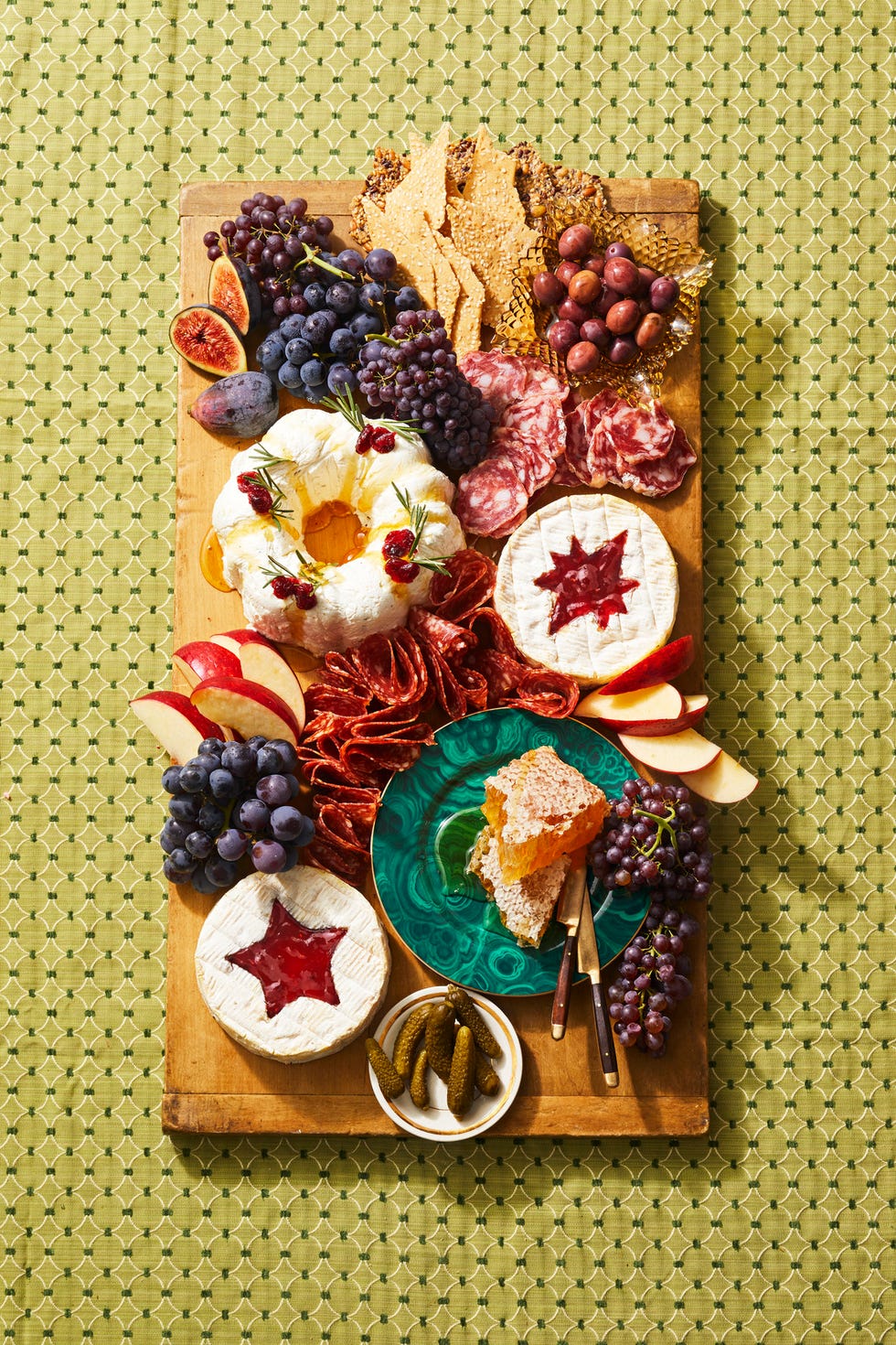 charcuterie spread with brie and cheese wreath with orange thyme.