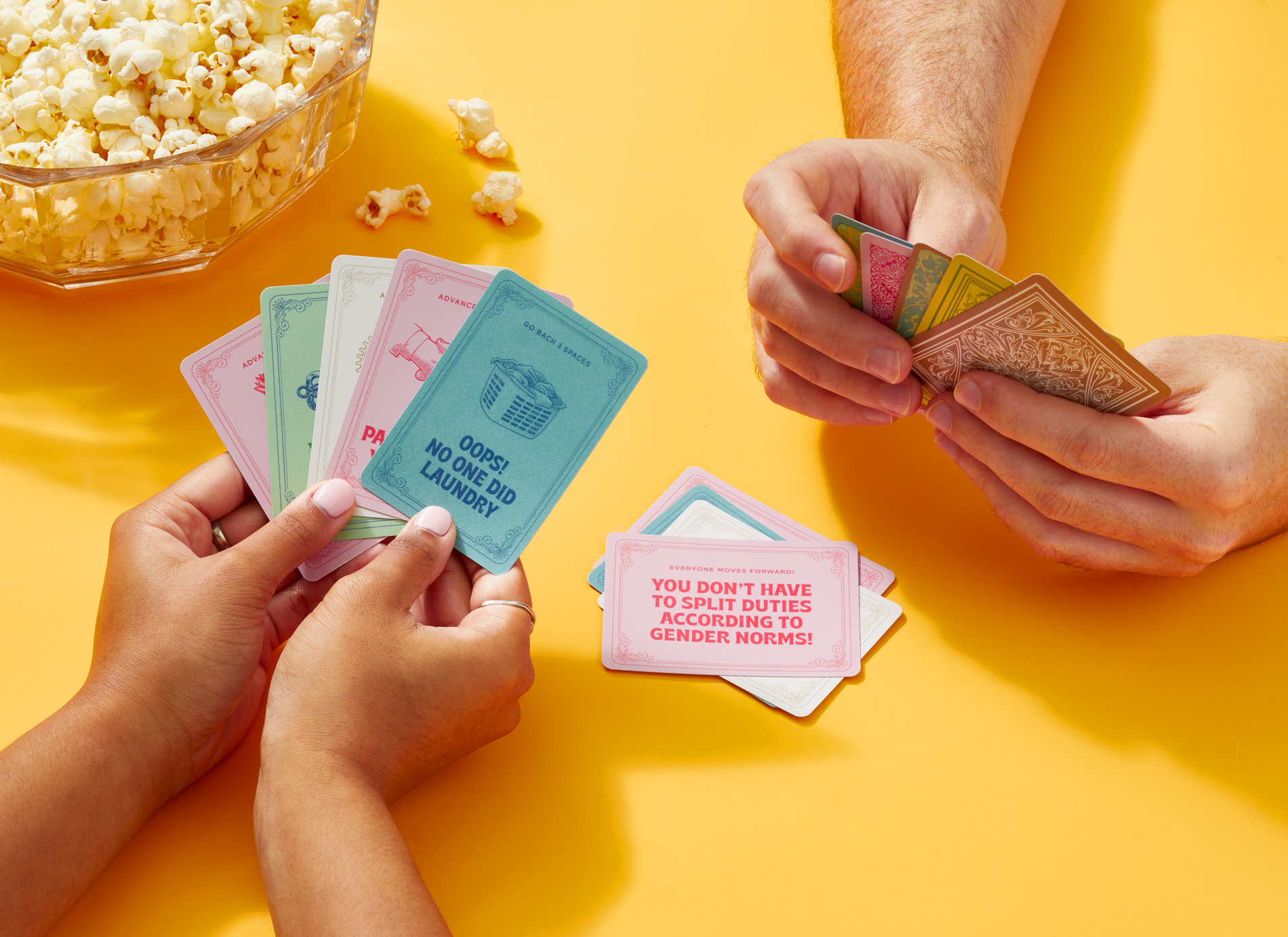 couple playing share the load card game