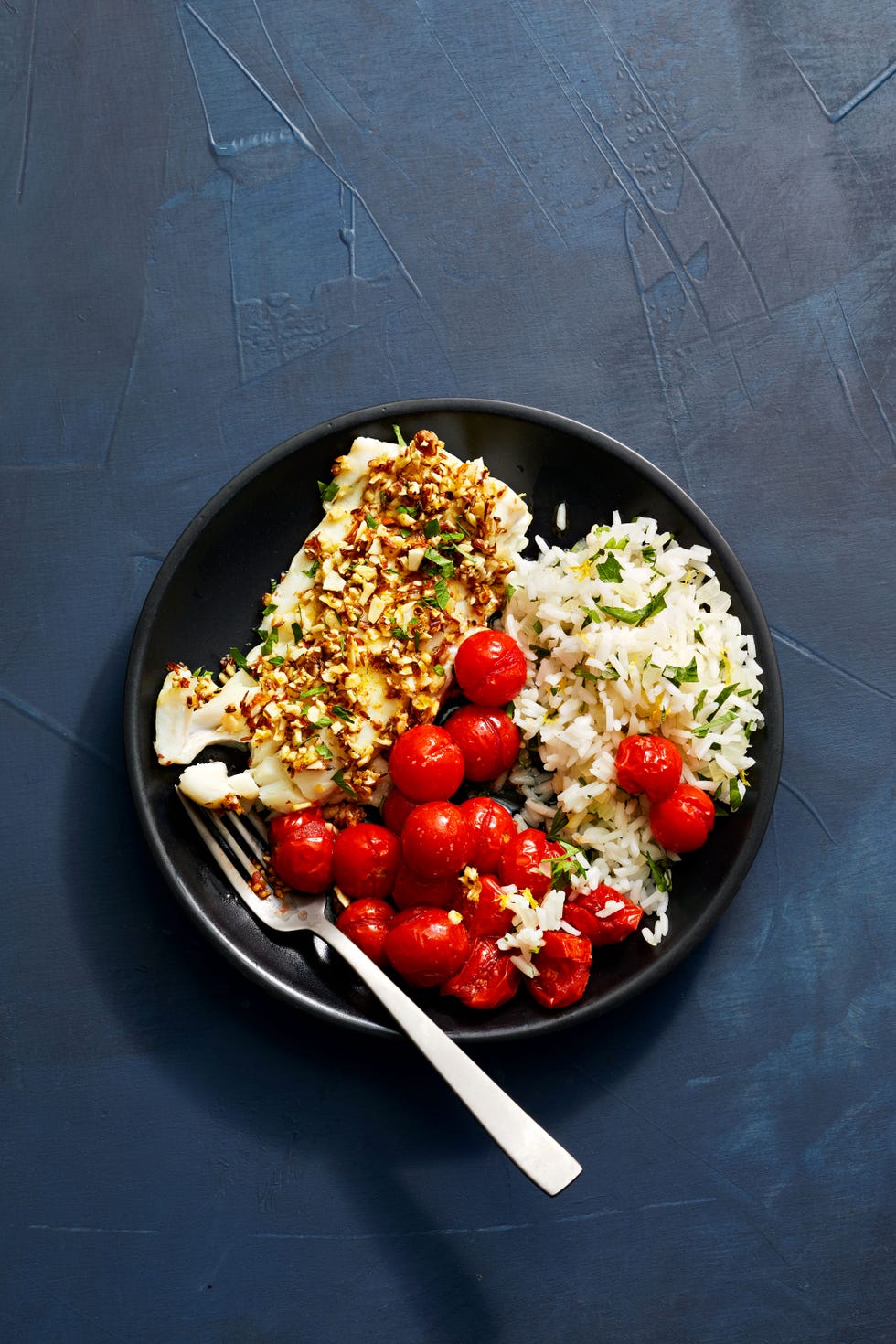 tomato roasted cod with spiced almonds