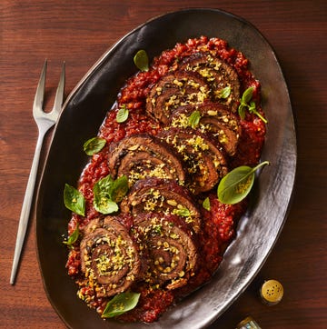 Sicilian style braciole new years eve dinner sicilian style braciole over pureed tomato served on a platter