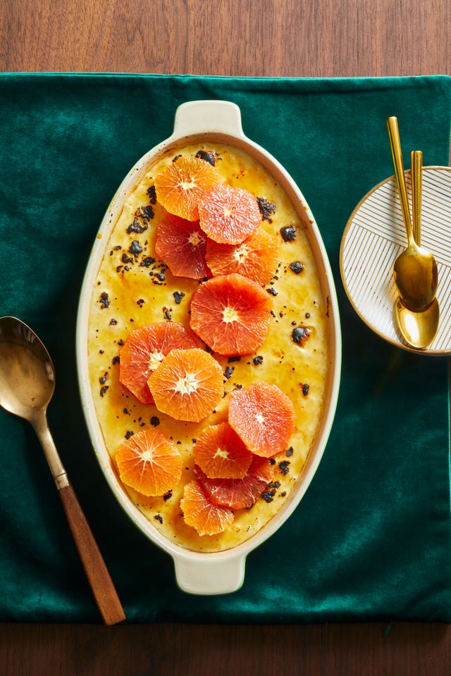 bruleed rice pudding with slices of orange and grapefruit served on top