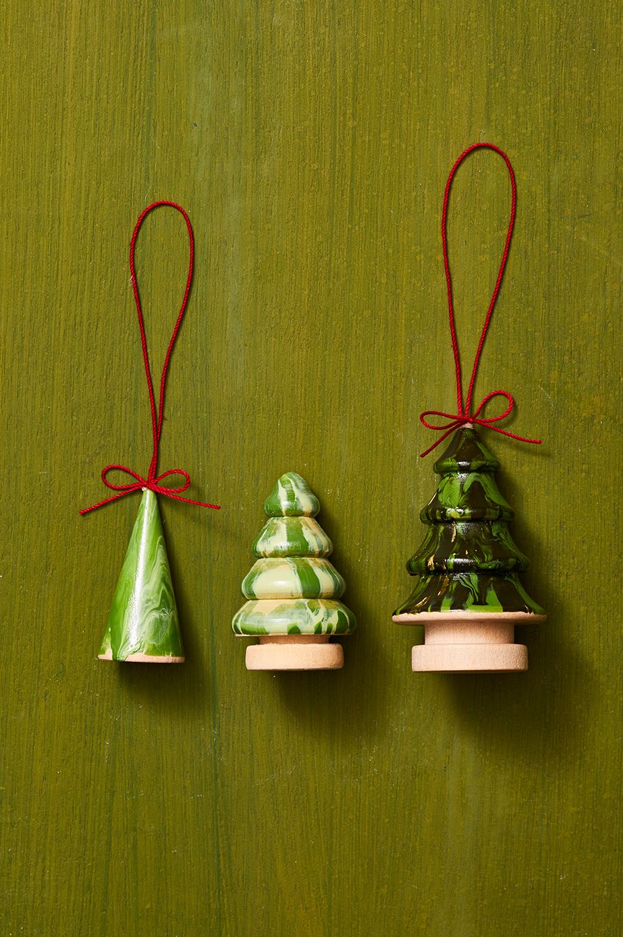 homemade christmas ornaments made of wooden tree figurines
