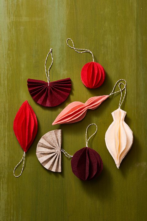 diy christmas ornaments made of red, pink and purple felt