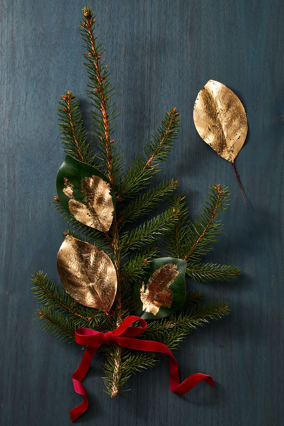 diy christmas gold leaves on pine tree branch