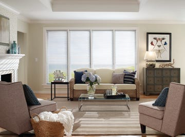 Living room, Furniture, Room, Interior design, Couch, Property, Coffee table, Window covering, Table, Brown, 