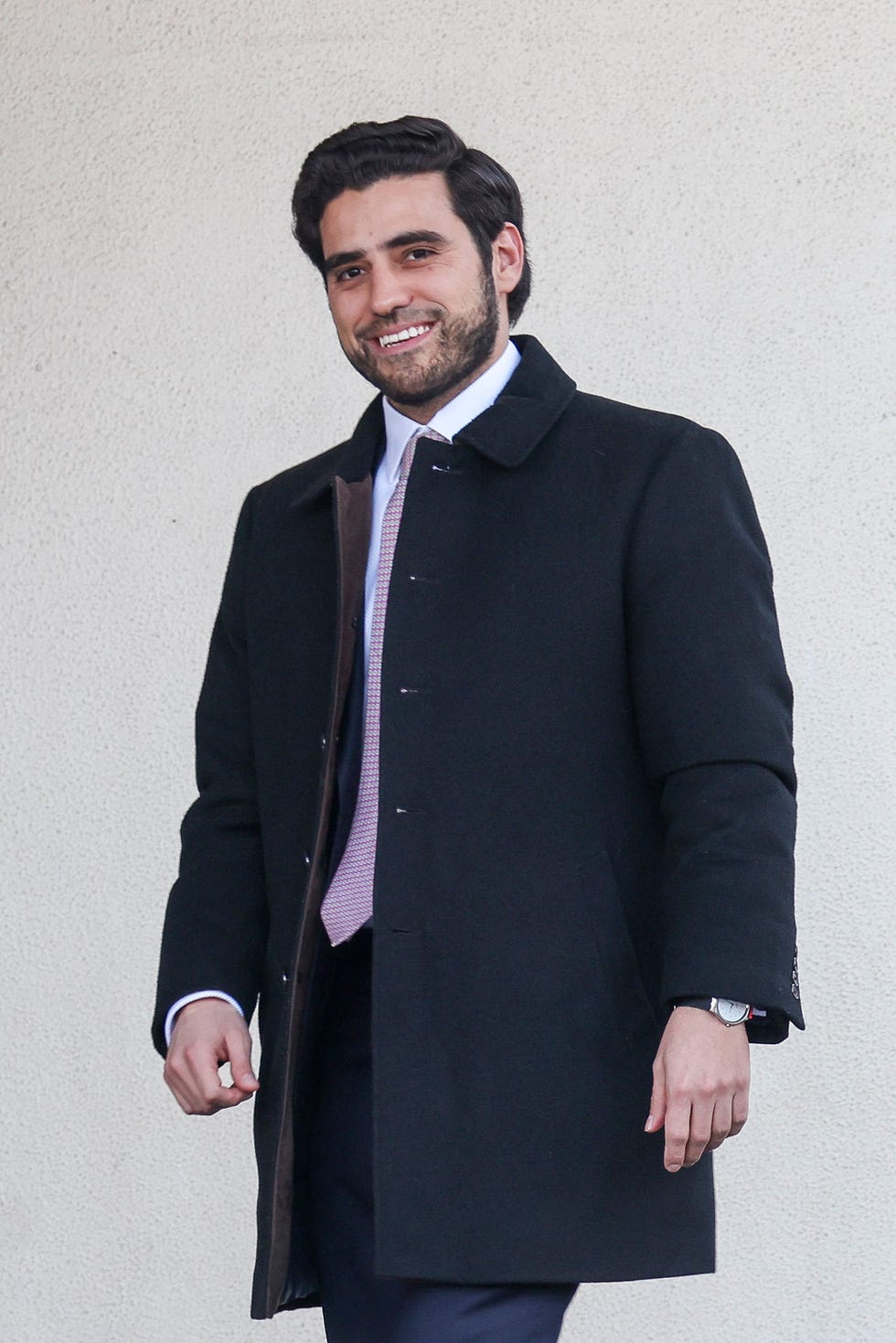 a man in a suit and tie