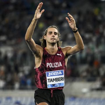gianmarco tamberi of italy waves to the crowd after...