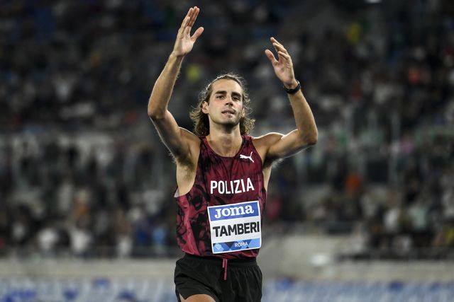 gianmarco tamberi of italy waves to the crowd after...