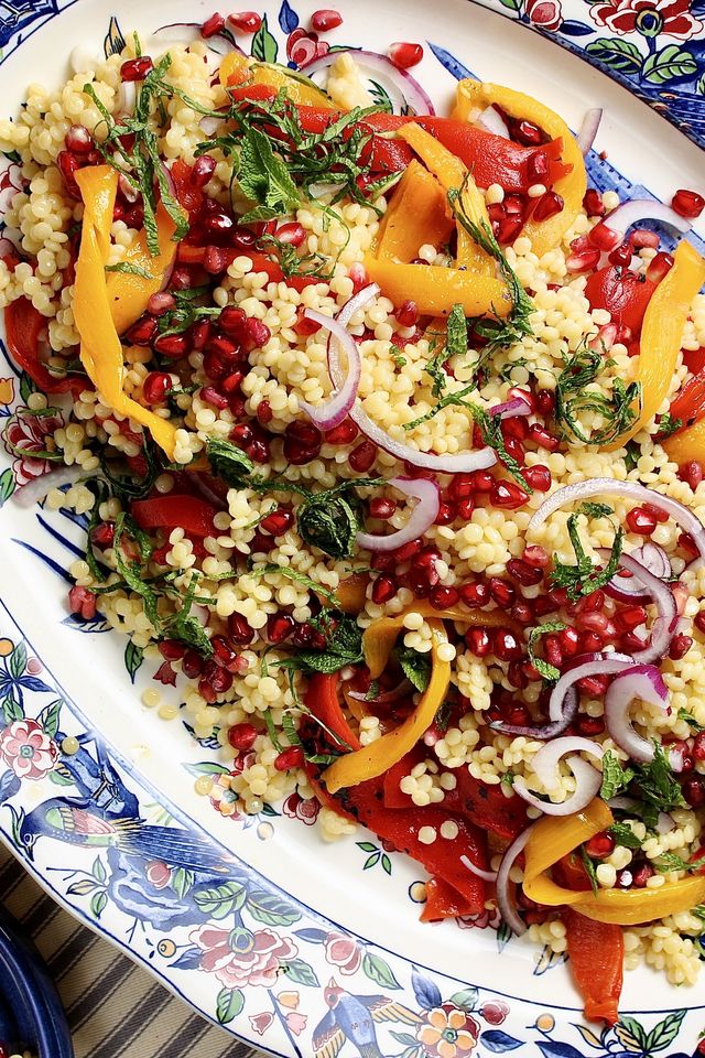giant couscous salad with pomegranate and orange dressing