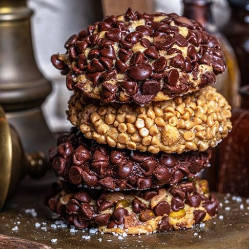 a stack of cookies from gideon's bakehouse, a good housekeeping pick for the best things to do in orlando