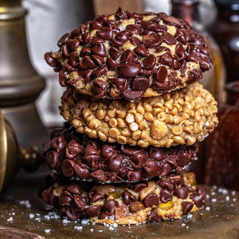 a stack of cookies from gideon's bakehouse, a good housekeeping pick for the best things to do in orlando