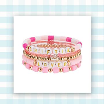 taylor swift lover friendship bracelet set in pink and glittery pink crocs