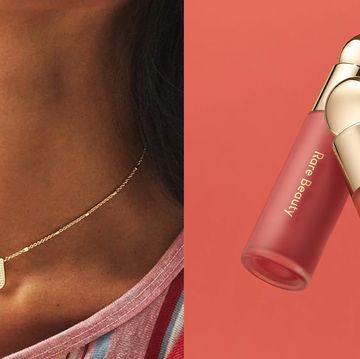 initial necklace next to rare beauty lip gloss