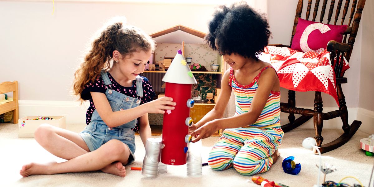 girls playing with homemade rocket