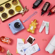 This is an image ipad, vadham tea set, bushwick kitchen honey, reel viewfinder, briogeo hair set, instax camera, kosterina chocolate, vitruvi diffuser, haus, slip pillowcase, fenty skin starters