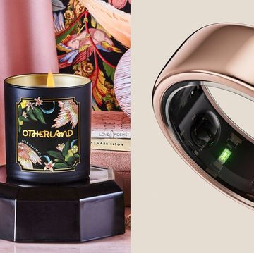 otherland candle side by side with oura ring