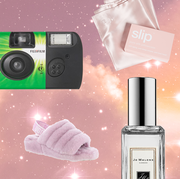 gifts including a pair of fuzzy slippers, a camera, perfume, and a silk pillowcase are arranged over a pink starry sky