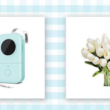 light blue label maker and a bouquet of flowers on a blue and white background