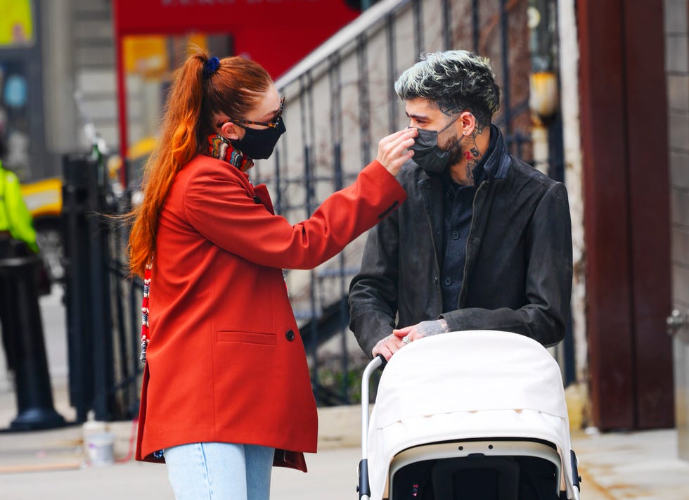 Gigi Hadid takes her daughter out for a stroll during a lunch outing with  Bella Hadid