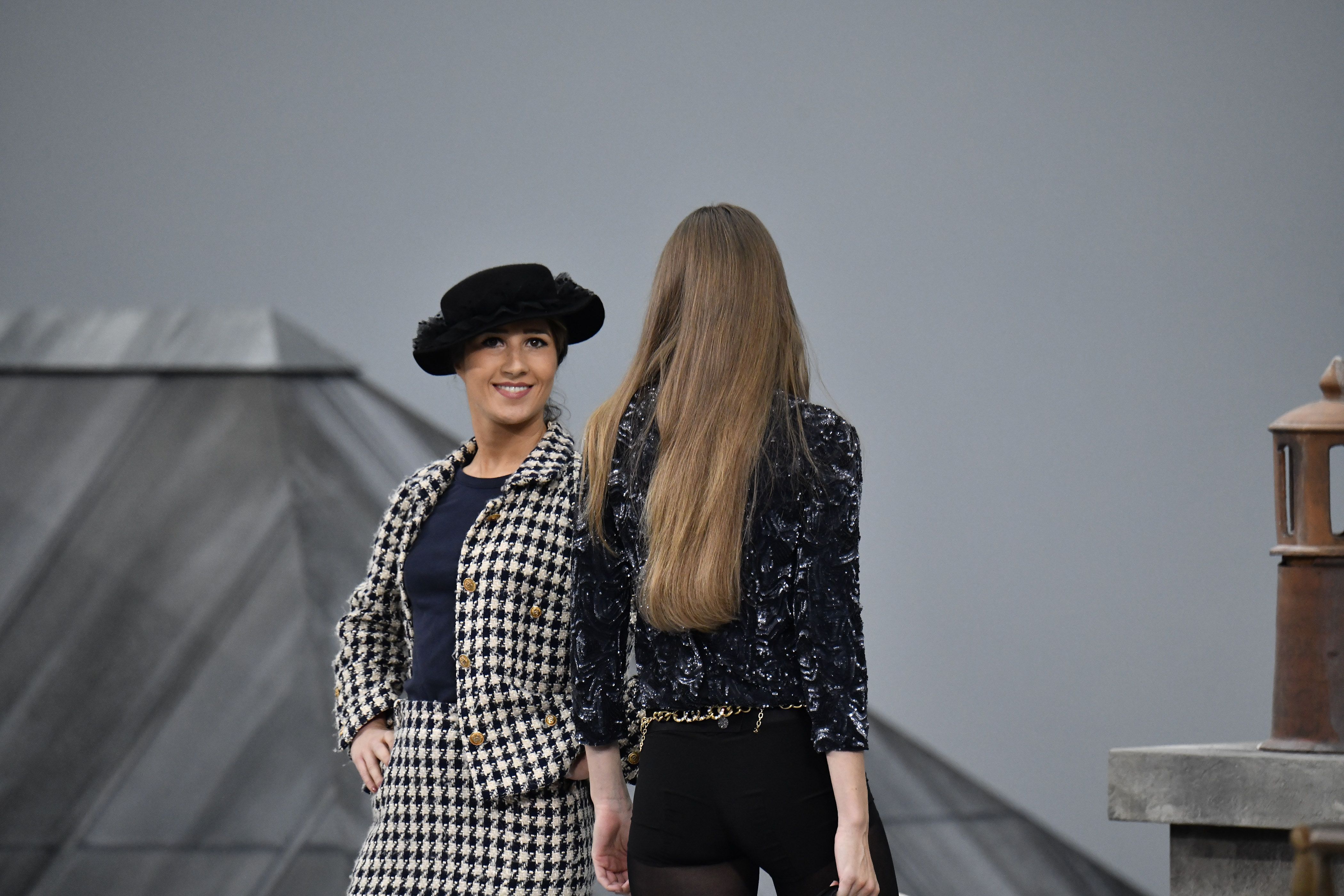 Watch Gigi Hadid Escort a Woman Crasher Off the Chanel Runway