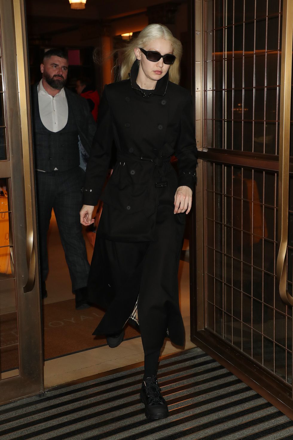london, england   march 11 gigi hadid leaving her hotel before heading to the burberry aw 2023 womenswear collection presentation at central hall westminster on march 11, 2022 in london, england photo by neil mockfordgc images