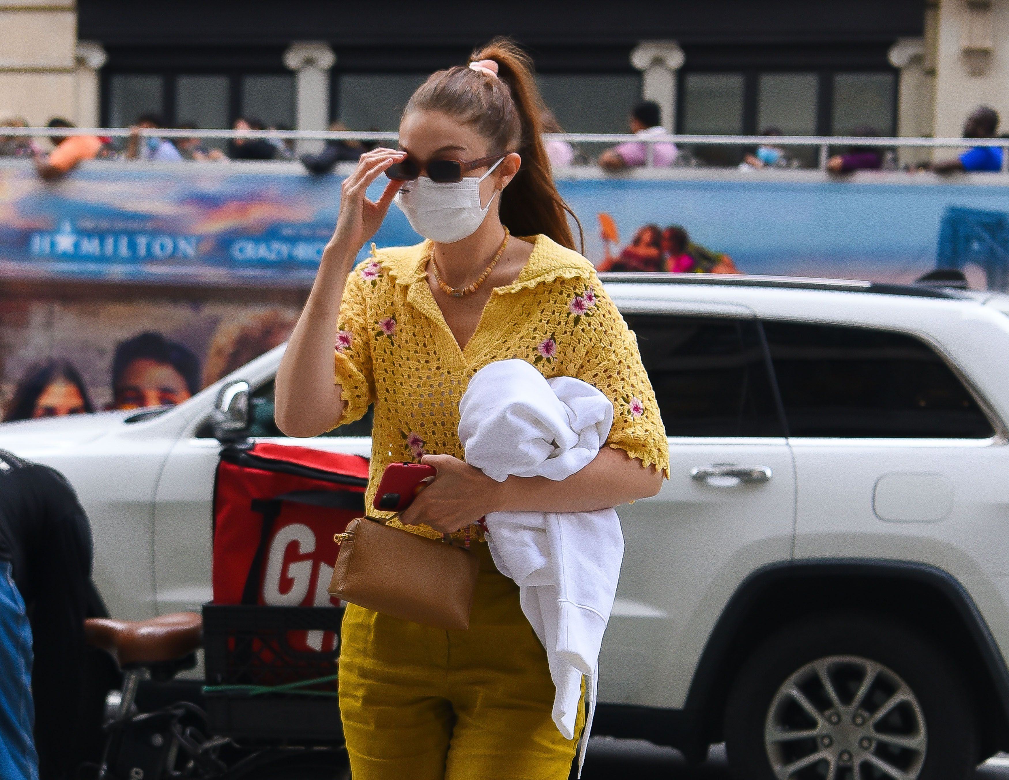 Gigi Hadid Shines in a $50 Yellow, Crocheted Polo Top in NYC