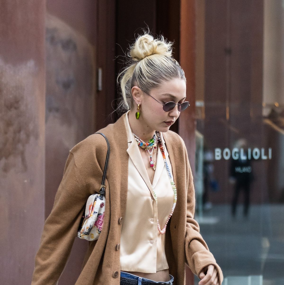 Gigi Hadid Wears a Cozy Cardigan and Colorful Accessories in NYC
