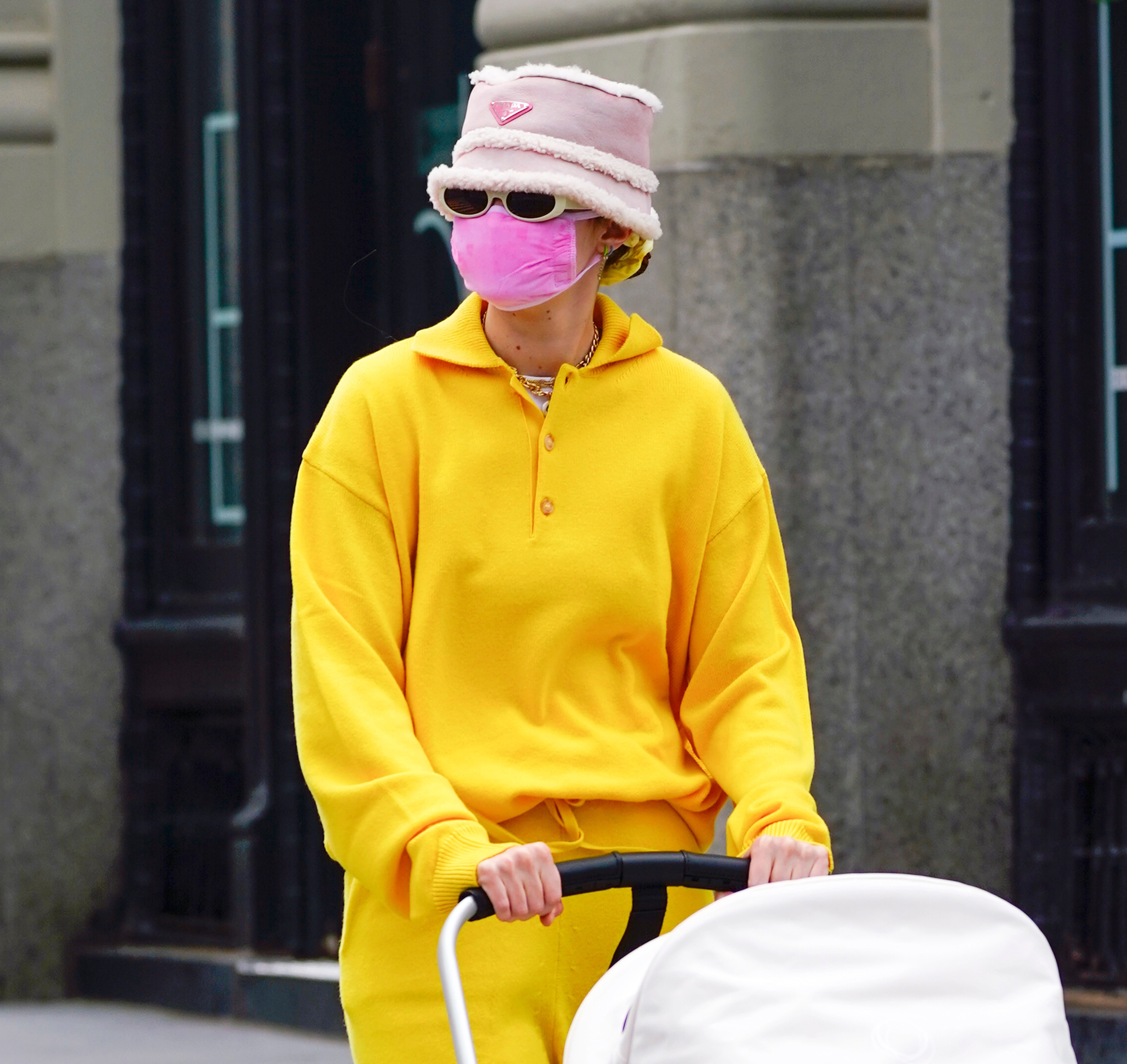 Gigi Hadid Wears a Yellow Sweat Suit and Prada Bucket Hat in NYC