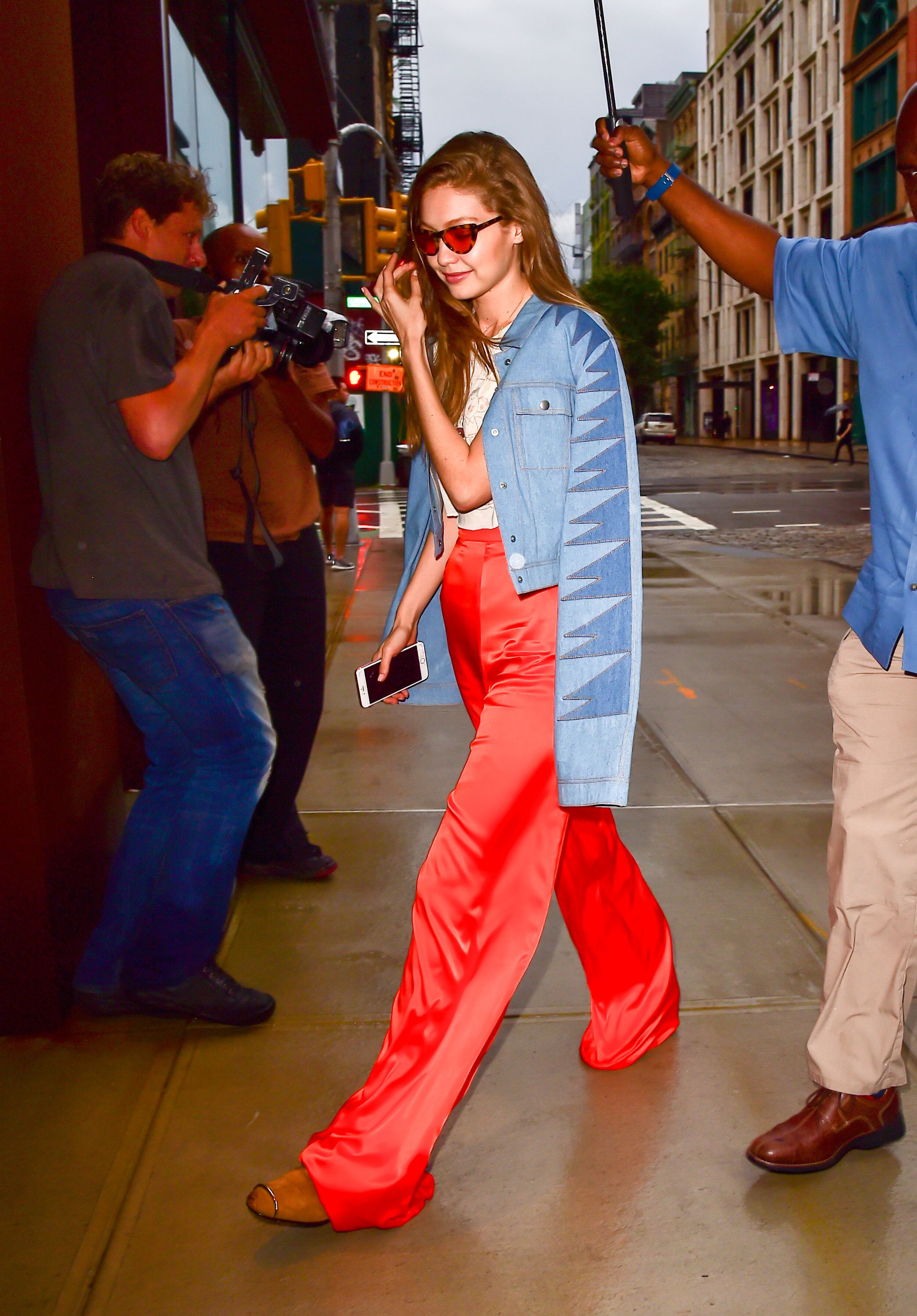 gigi hadid looks fashionable in a white vest with matching trousers while  stepping out in new york city-070921_7