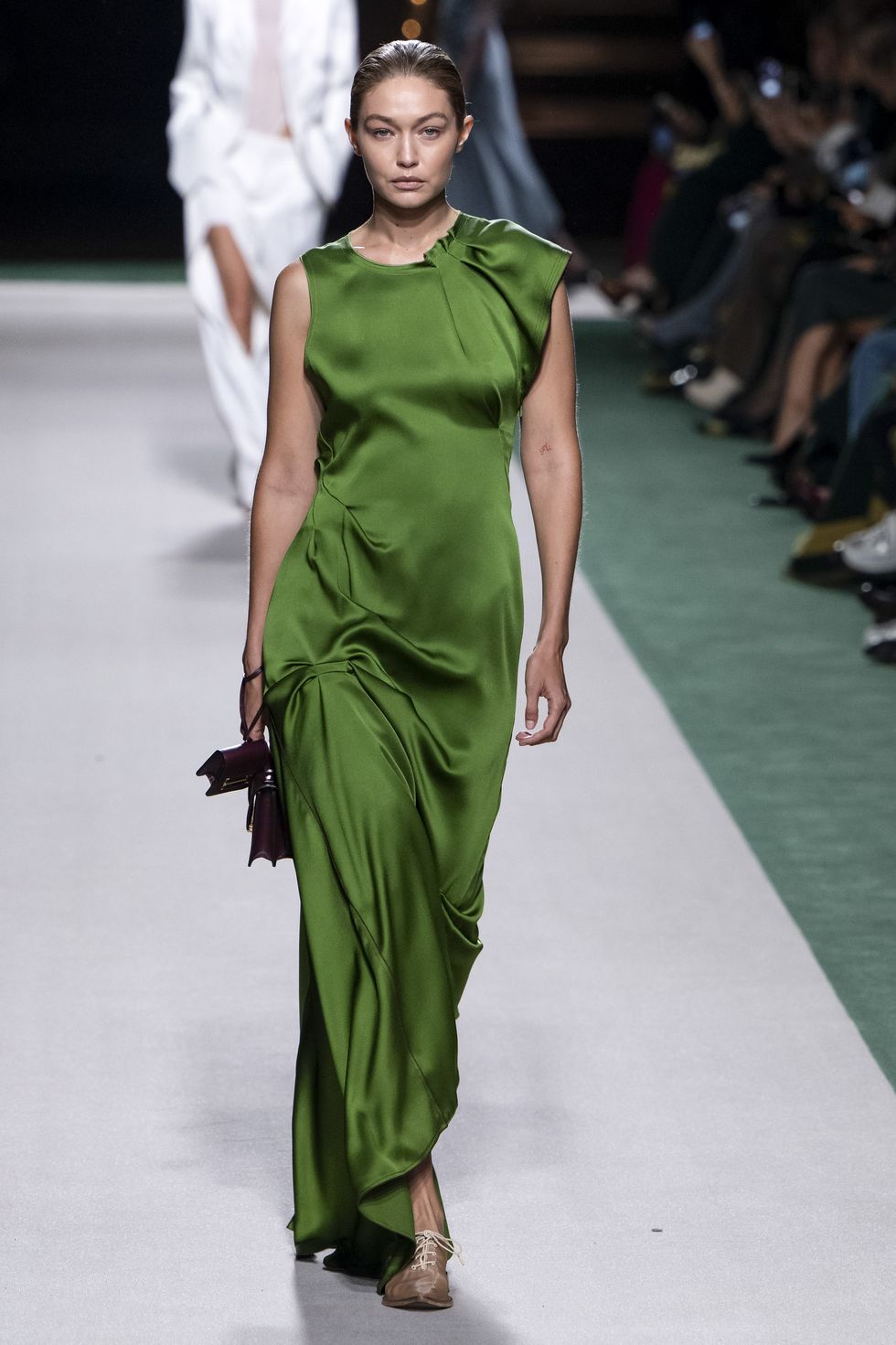 gigi hadid in green during victoria beckham’s show﻿