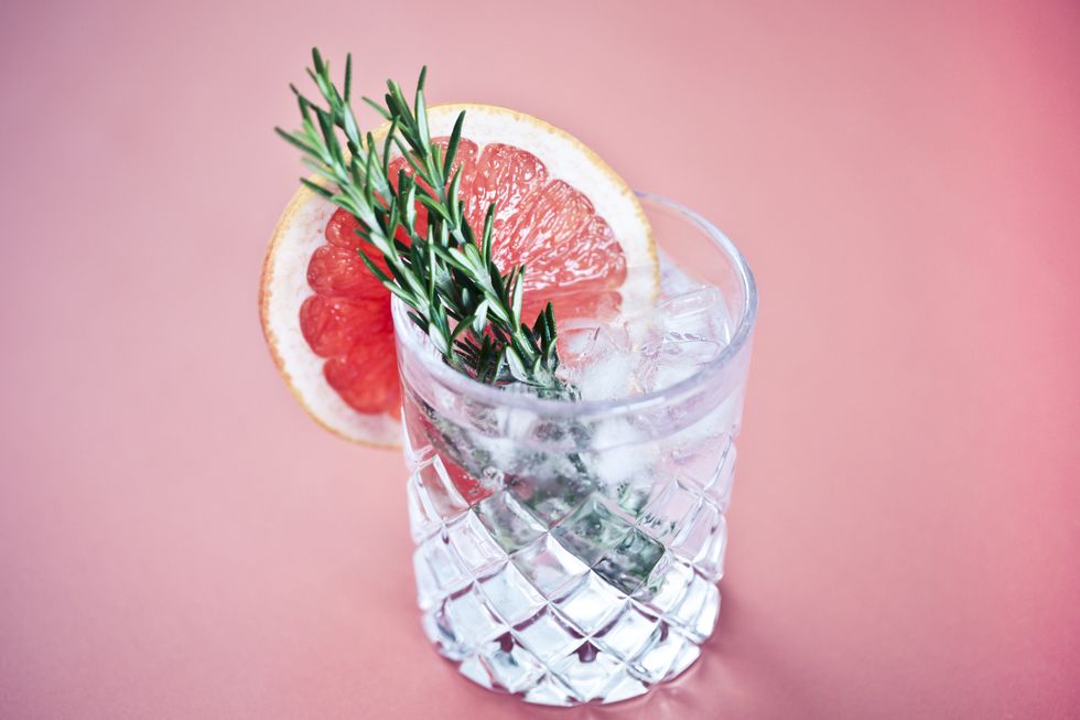 Gin and tonic with a slice of pink grapefruit