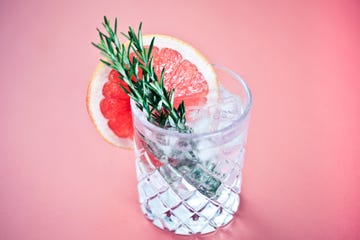 gin and tonic with a slice of pink grapefruit