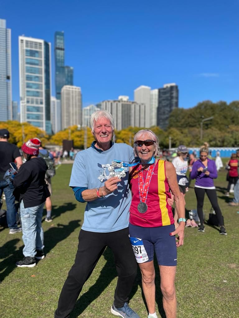 gina little and her husband ray celebrate her finishing the chicago marathon