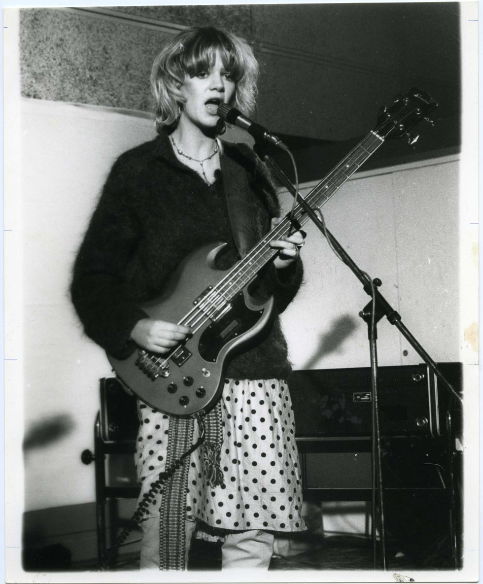 gina birch on stage in 1979