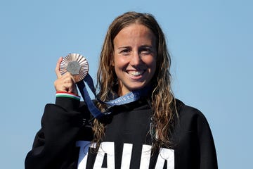 paris, france august 08 bronze medalist ginevra taddeucci of team italy poses on the podium during the marathon swimming medal ceremony after the marathon swimming women's 10k on day thirteen of the olympic games paris 2024 at pont alexandre iii on august 08, 2024 in paris, france photo by clive rosegetty images