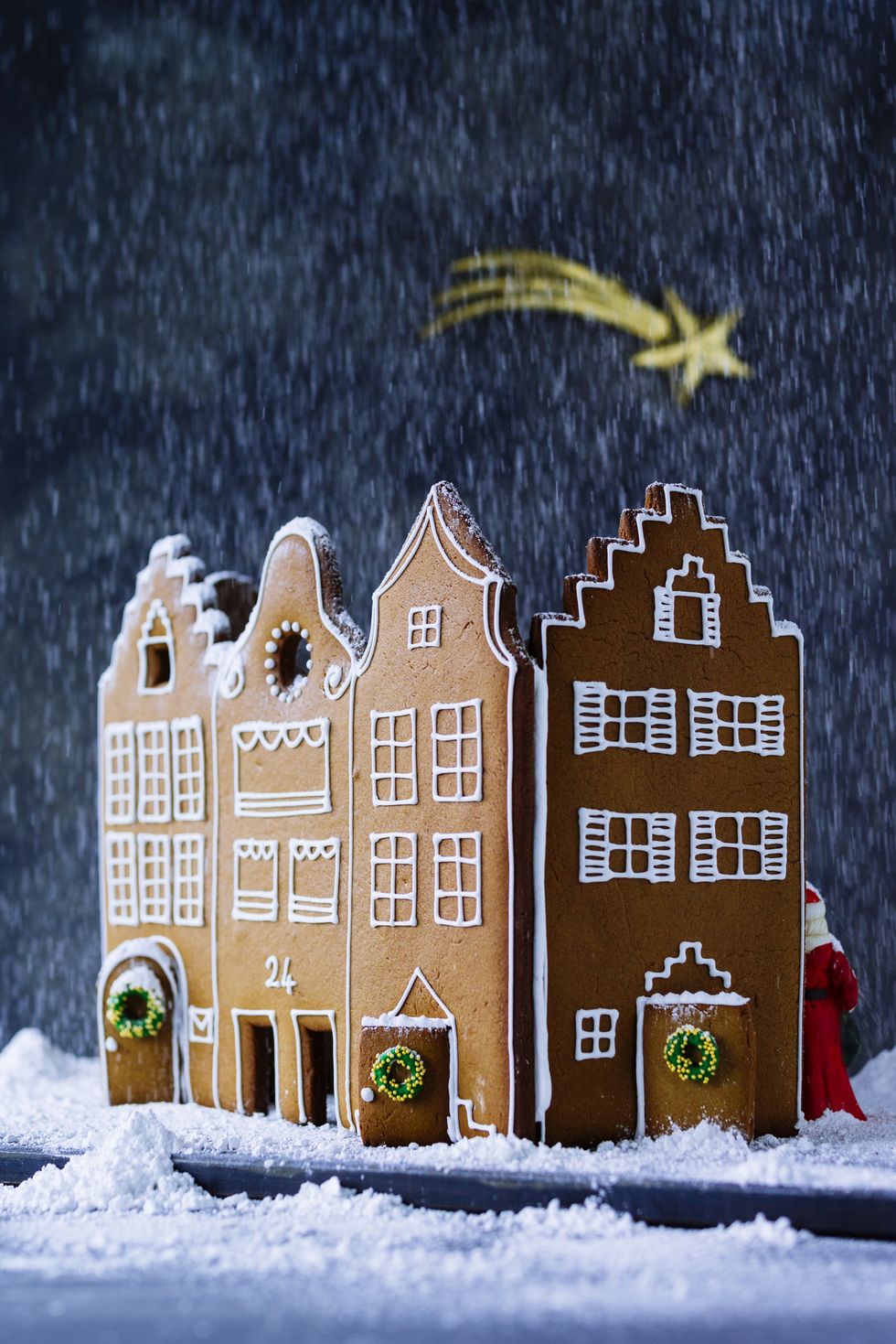 gingerbread house in artificial snow