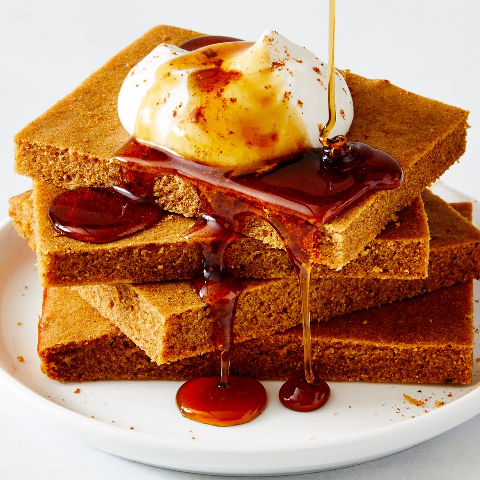 gingerbread latte sheet pan pancake topped with whipped cream and maple syrup