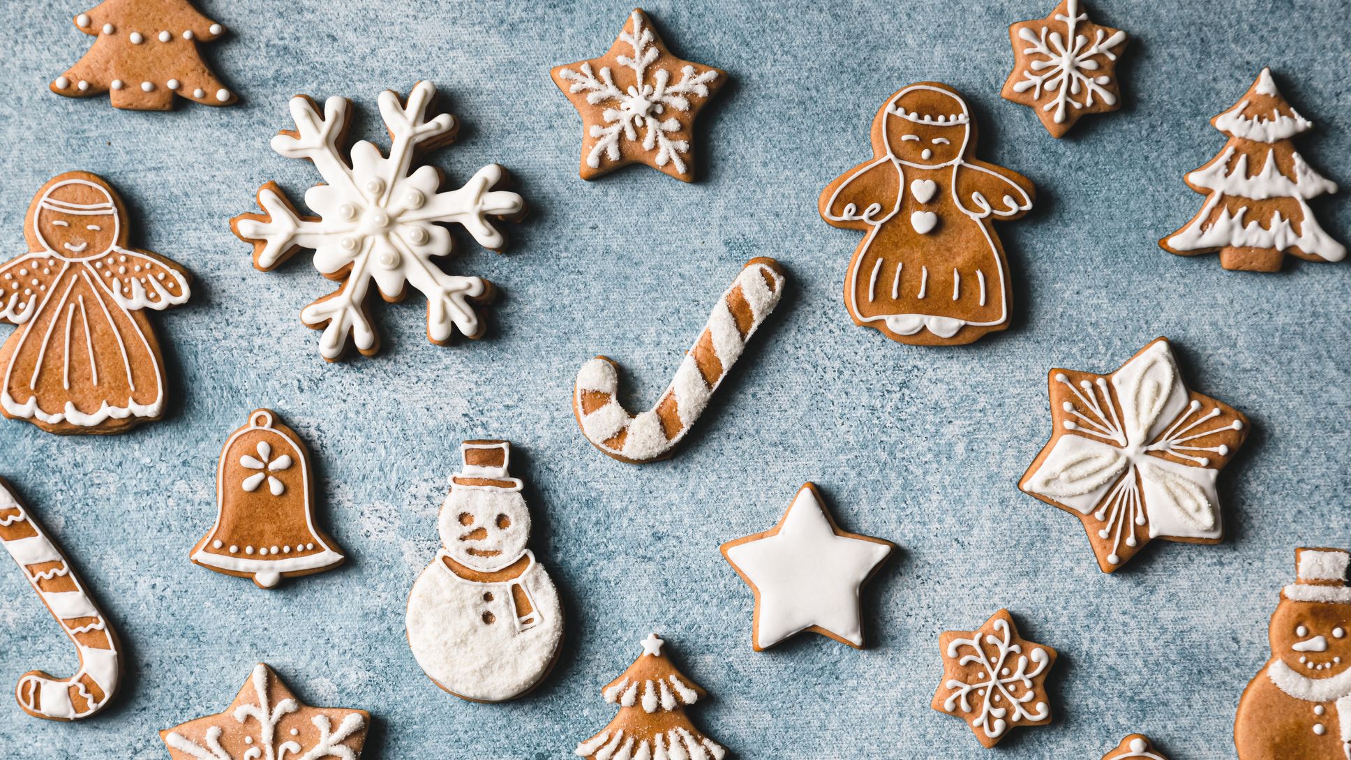 Baked star-shaped gingerbread cookies powdered with sugar for