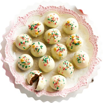 a platter filled with decorated white chocolatecovered treats