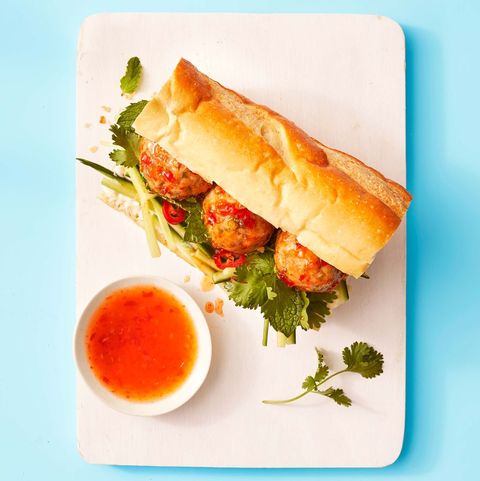 gingery pork meatball subs with an orange dipping sauce