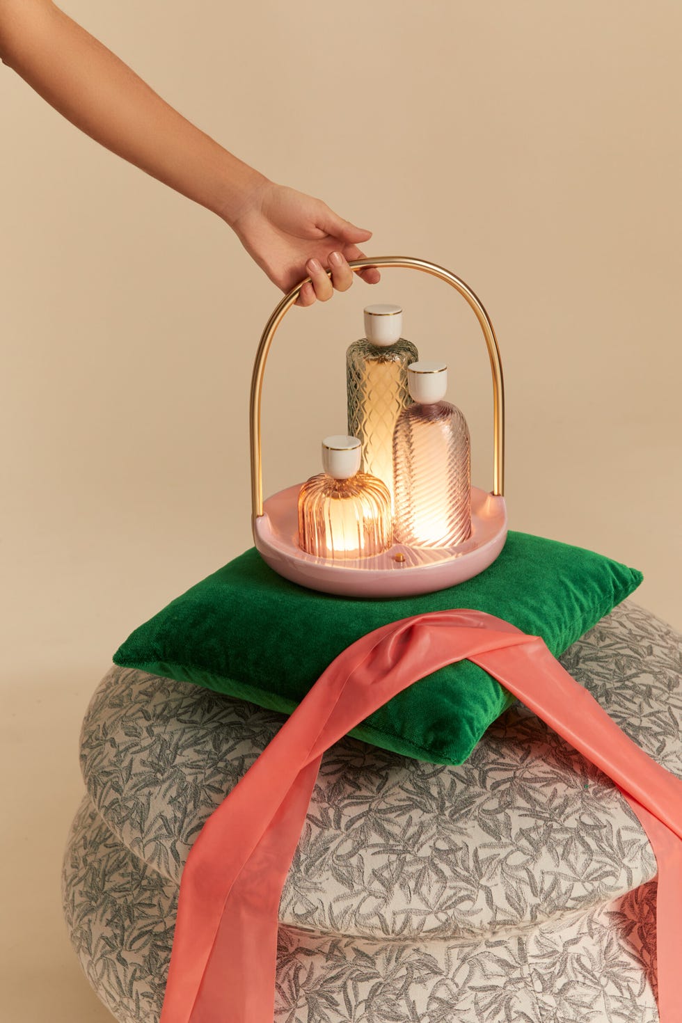 a set of lights on a green pillow