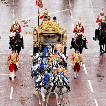 the diamond jubilee state coach, accompanied by the sovereign's escort of the household cavalry, travels along the mall in the king's procession ahead of the coronation ceremony of king charles iii and queen camilla in central londonpicture date saturday may 6, 2023 pa photo see pa story royal coronation photo credit should read gareth fullerpa wire