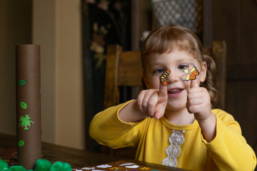 girl doing a craft