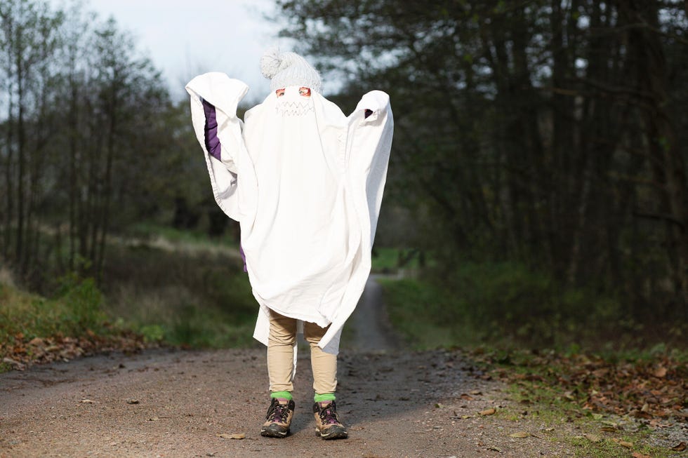 Girl dressed as ghost Girl dressed as ghost