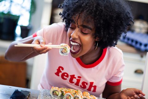 Girl eating sushi
