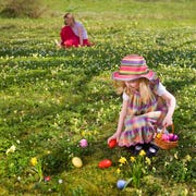 girl finding easter eggs girl finding easter eggs