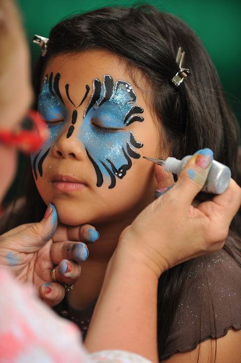 girl getting her face painted