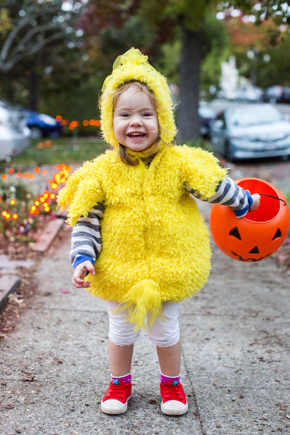 girl wearing halloween chicken costume